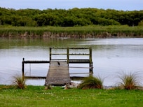 In front of this beautiful (old) but well renovated house, is a jetty mainly used by birds, not boats!