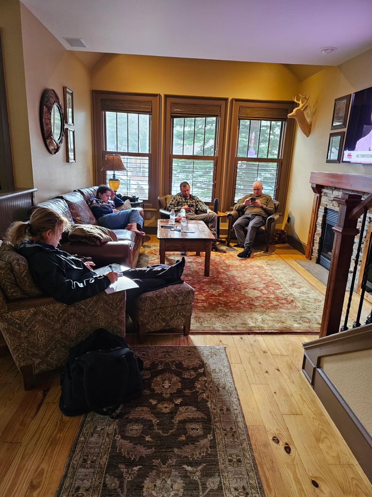 Family room with a tv and gas fireplace. Soo cozy