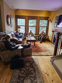 Family room with a tv and gas fireplace. Soo cozy