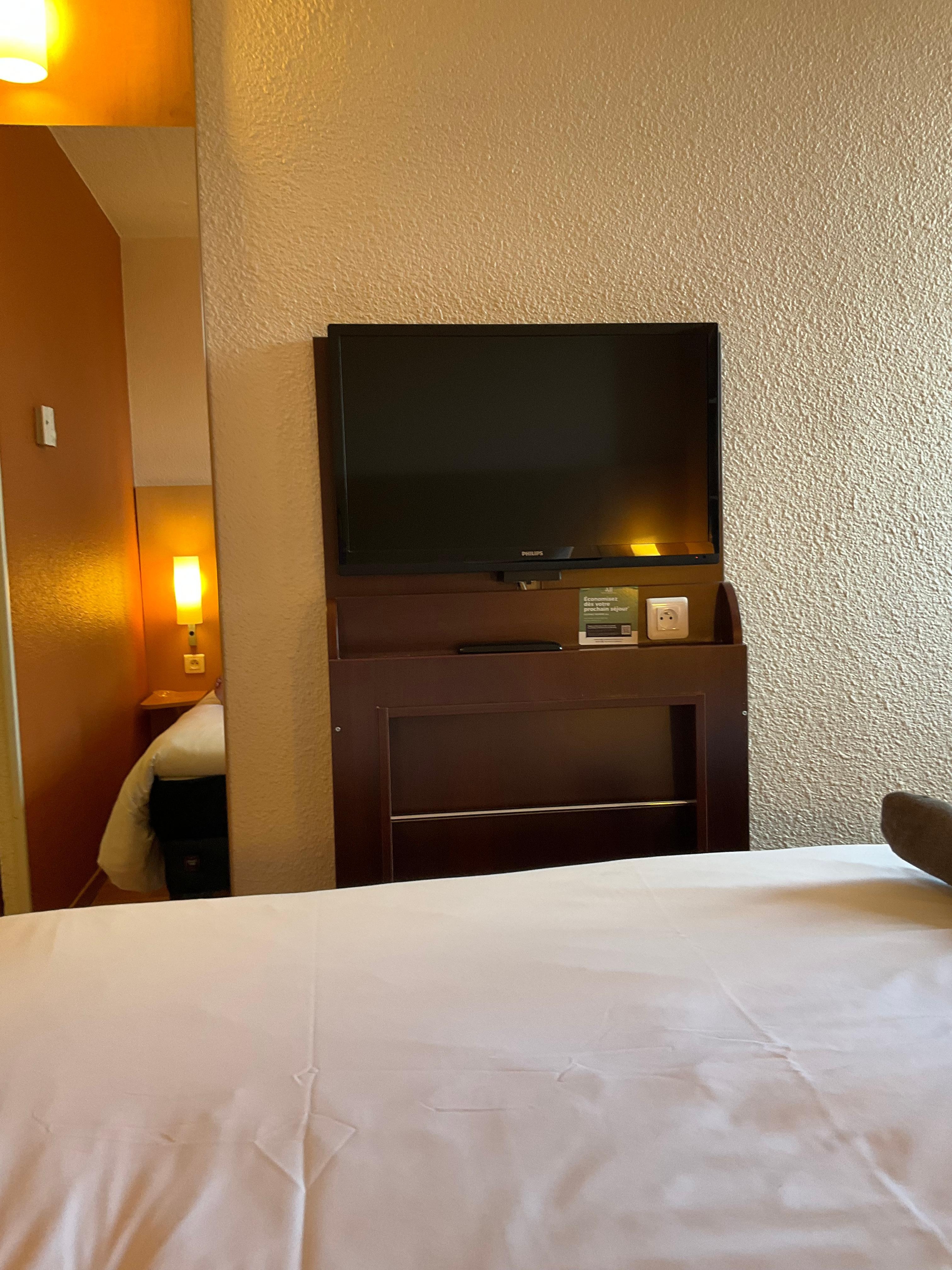 Very little space at the end of the bed and the wall