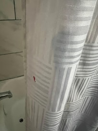 Stained shower curtain