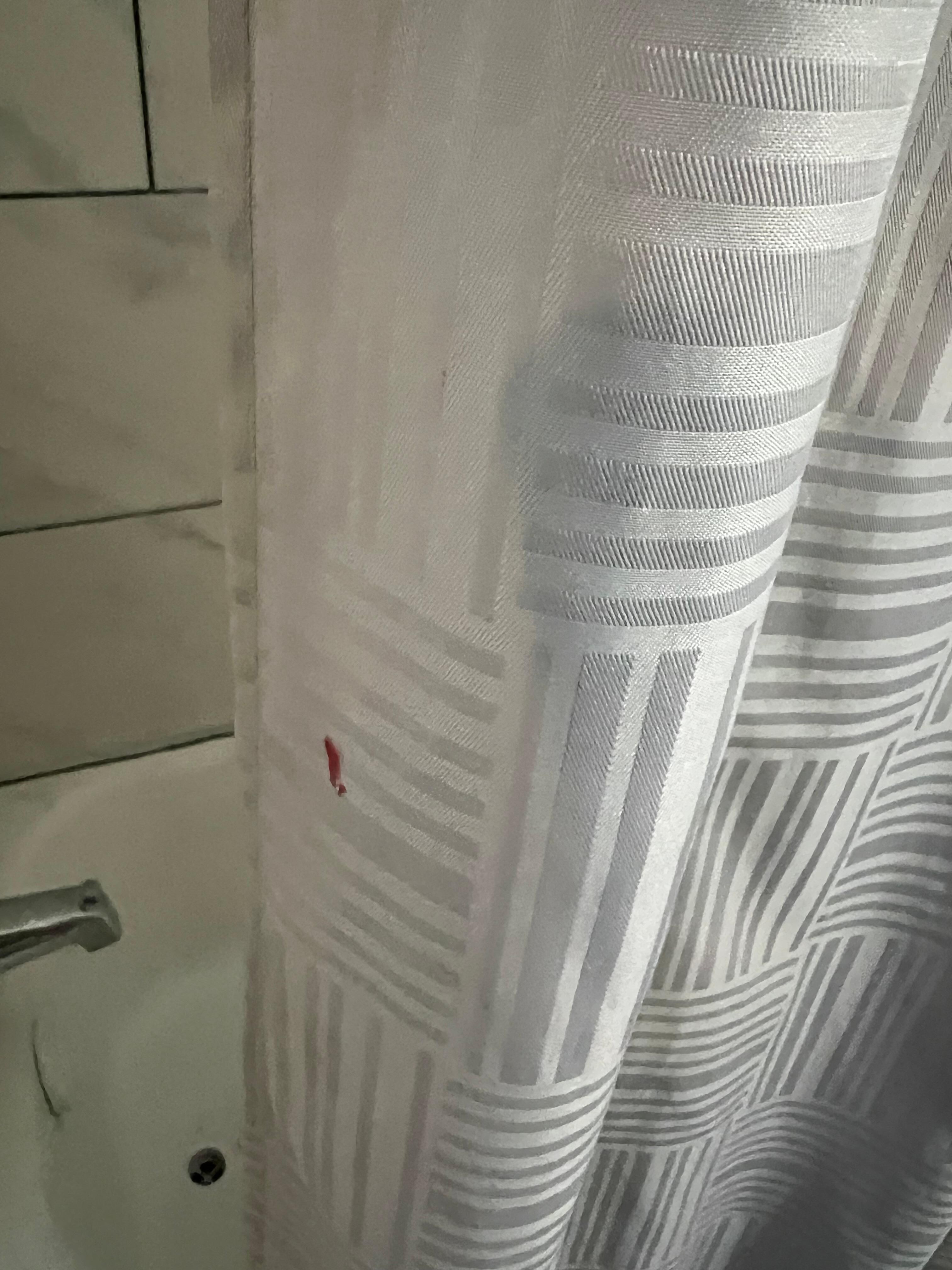 Stained shower curtain