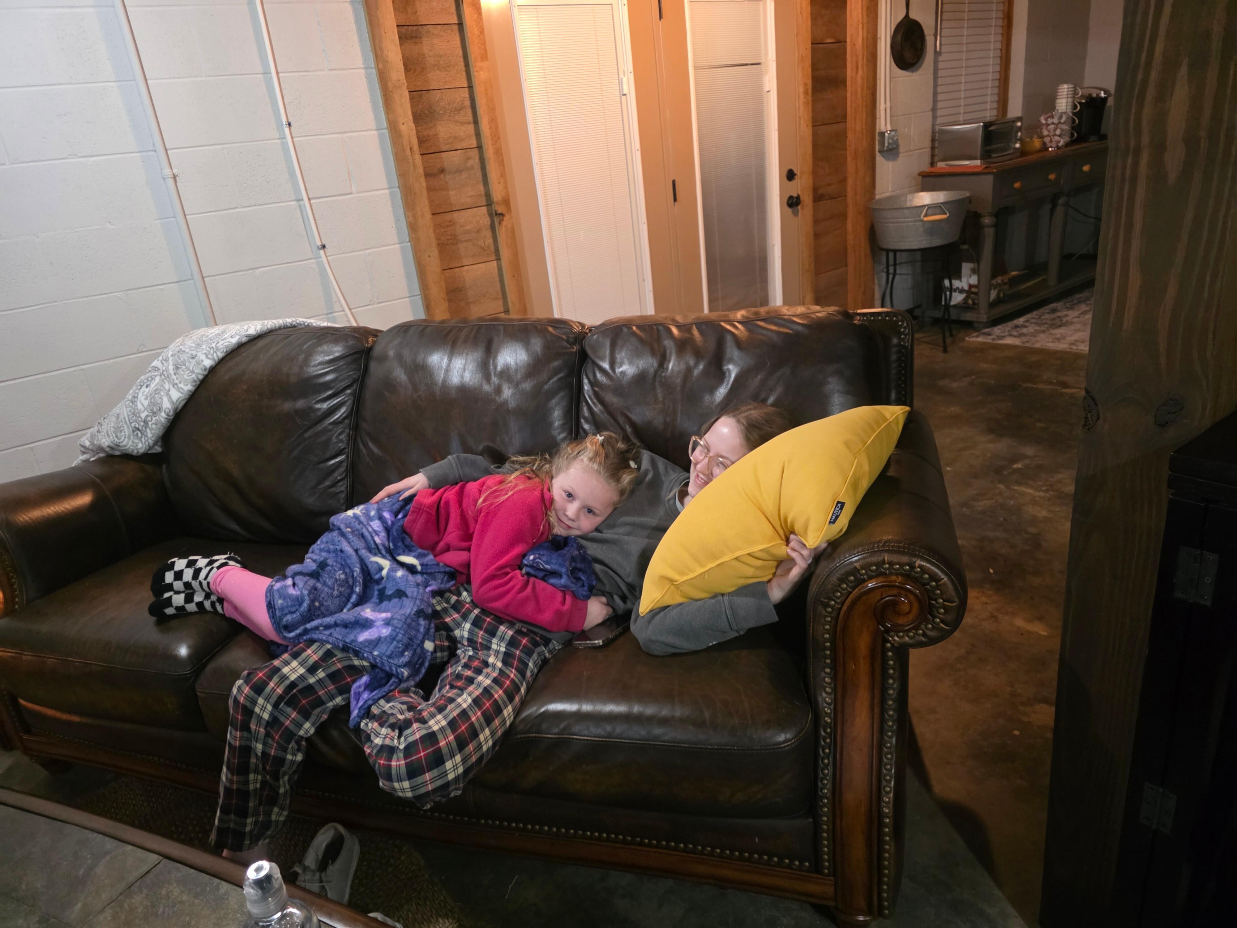 Family visiting watching YouTube and playing pool