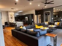 Main area- very large couch to fit a large group.