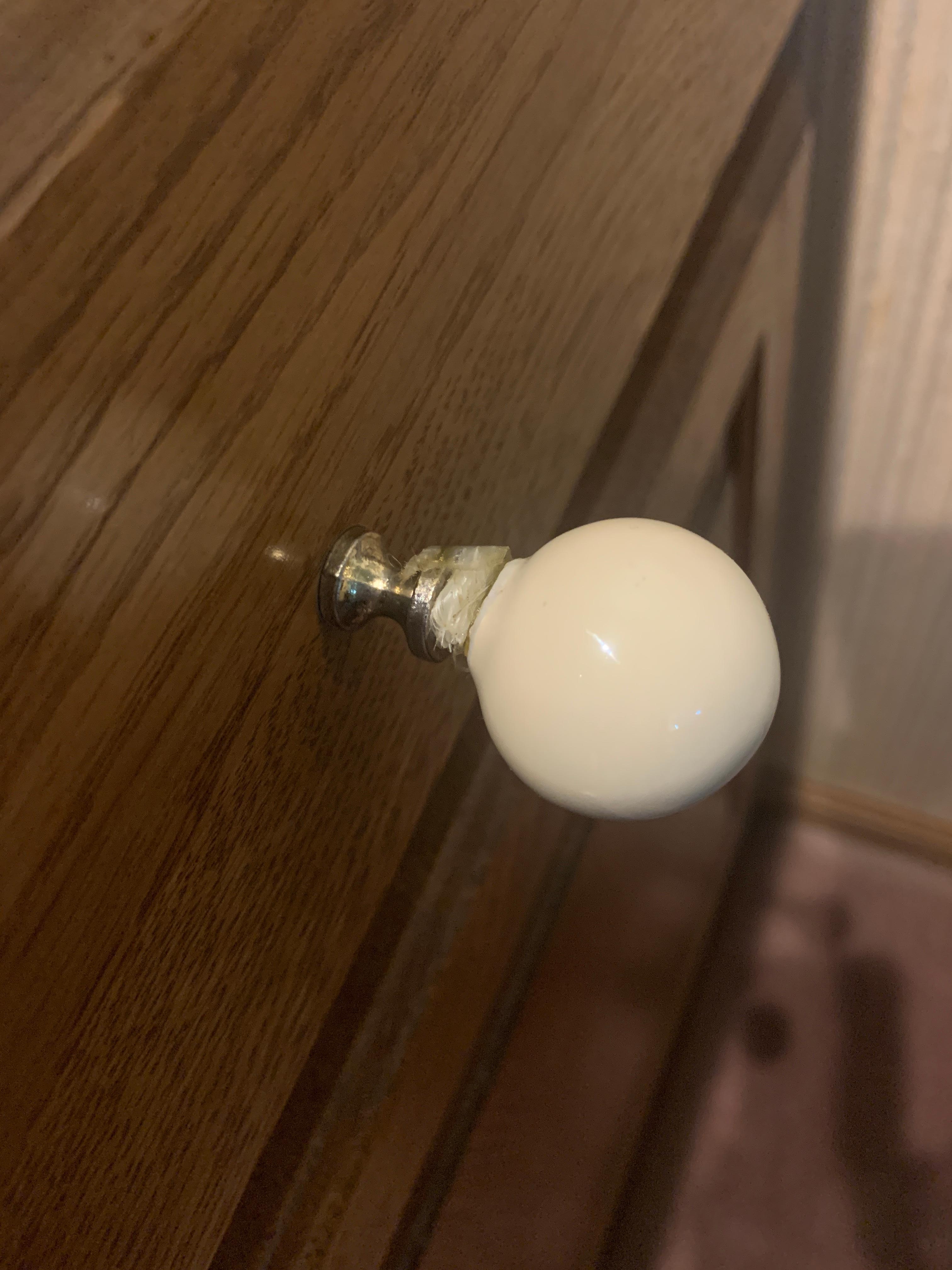 Drawer knobs replaced with tape.