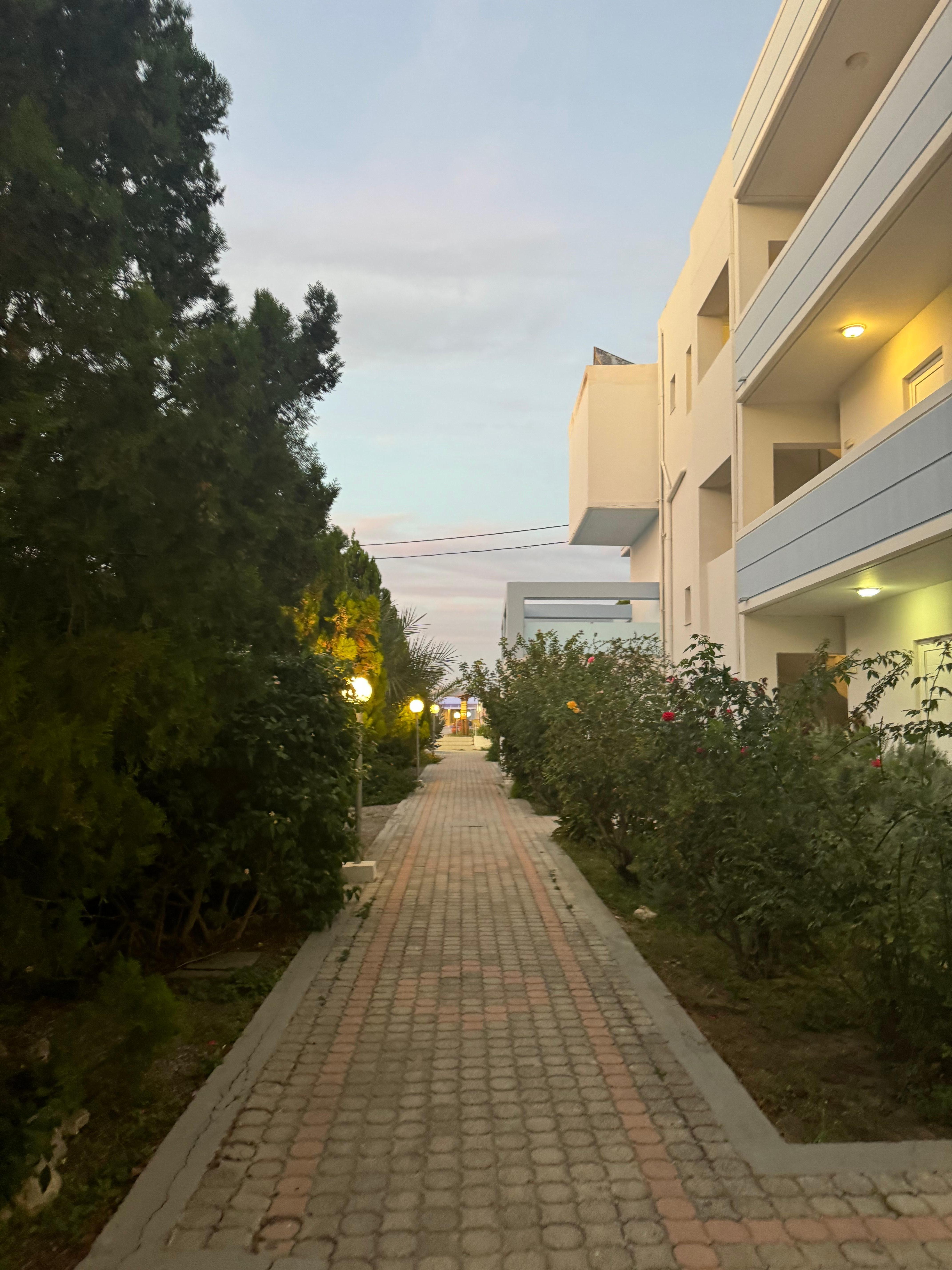 Between apartment block and main pool/ beach restaurant area 