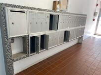 Lobby. All these PO Boxes opened giving the impression of a highly transient place