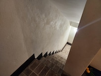 steps to the basement with no door to close