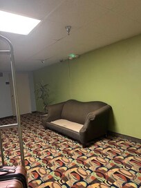 area ouside elevator on fourth floor  heavy cigarette smaell  like a dive bar before smoking bans