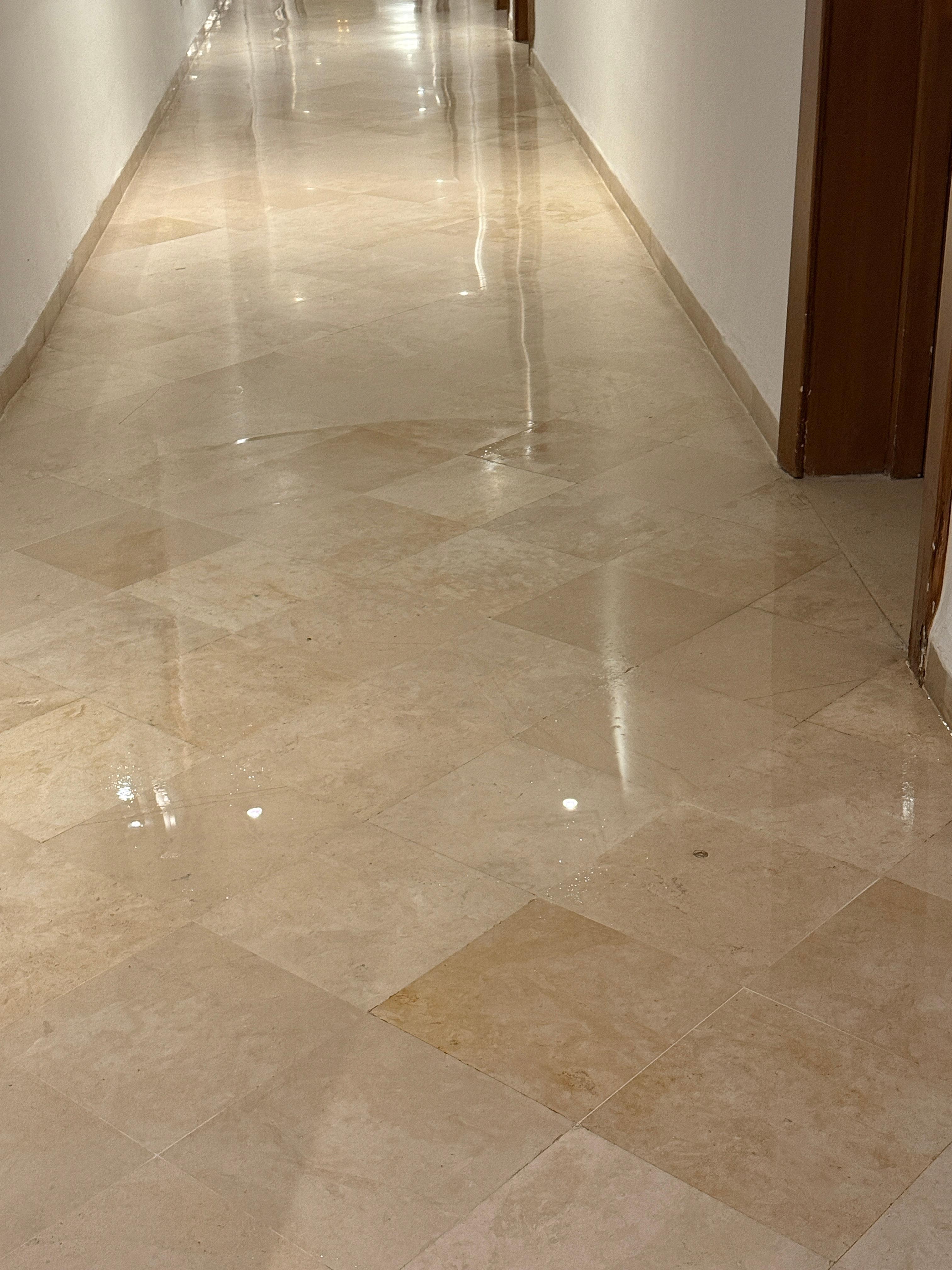 Puddle in front of the room door 