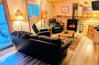 Downstairs living area with electric fireplace