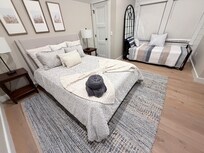 Master Bedroom with sleeper bed. Huge room!