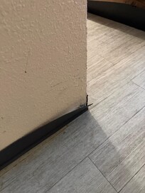 Dirty floors and walls. Broken base molding.