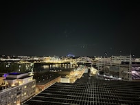 Night view with a drink in the rooftop
