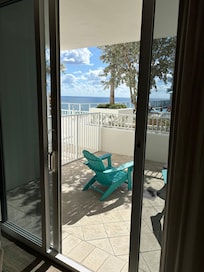 view from our room on 11th floor with gate off our patio to adult only pool and ocean view