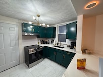 Kitchen. Excuse the doggy treats. This is a pet-friendly establishment, and we had our baby with us. 🐕🦺😊