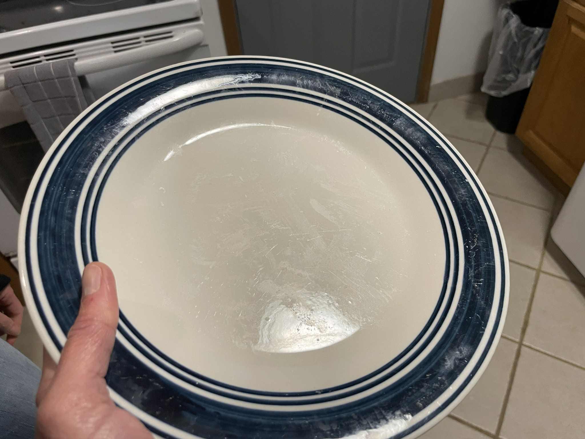 Plate in the cabinet (other dishes were also dirty--not all) But I definitely felt compelled to wash everything I used