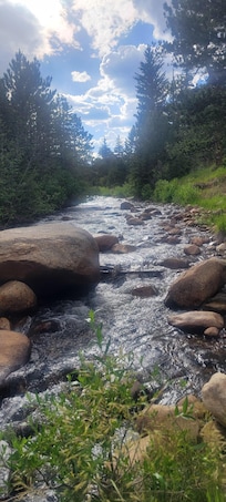 Sitting on a rock on the river looking west.