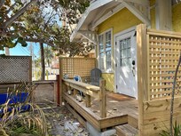 entry with gate to parking alley