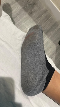 Socks show how to dirty the floor was.