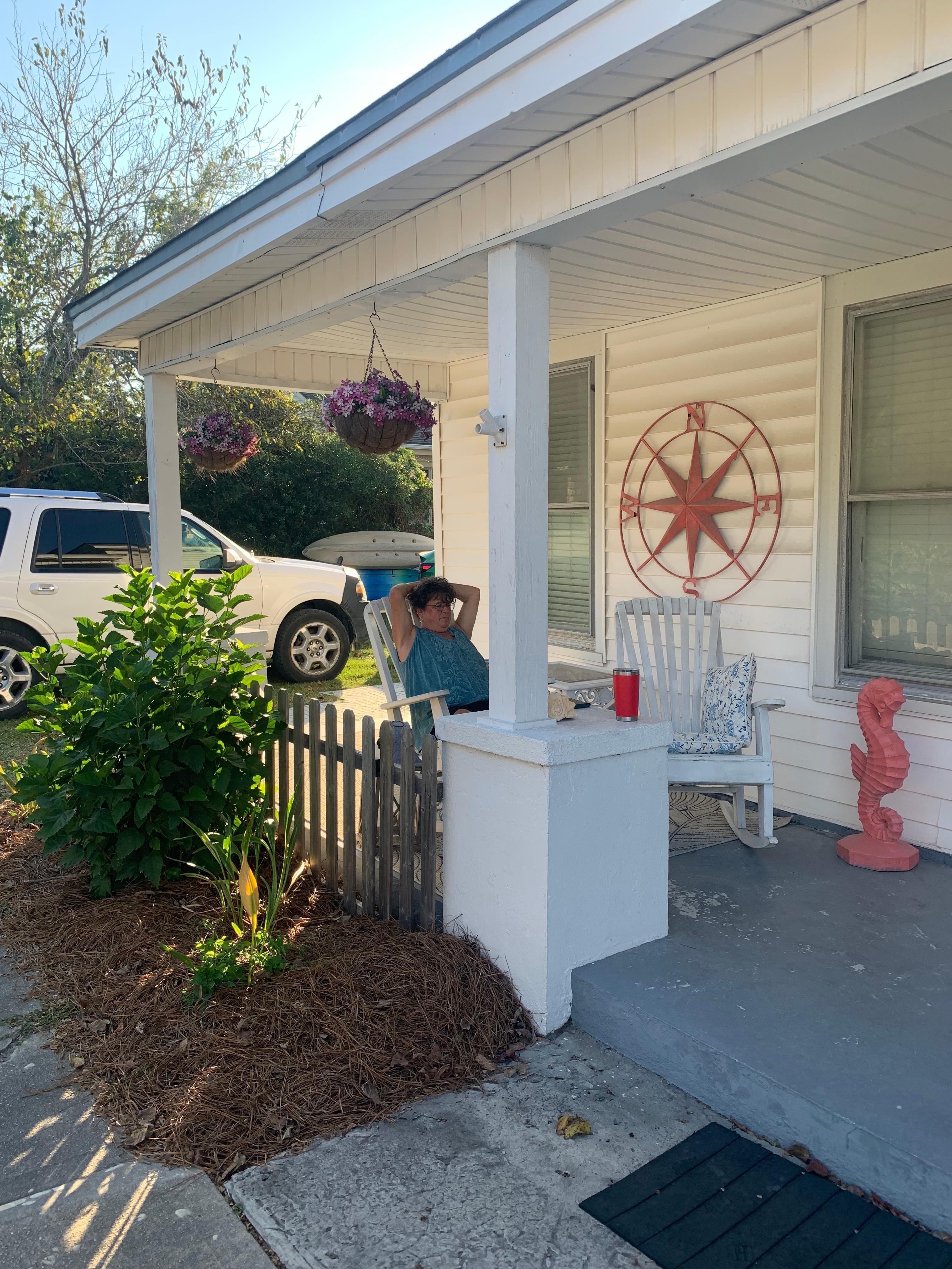 Cozy front porch sitting at 223 Queen street cottage