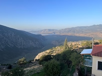 View during the day.  Bay of Corinth in the distance