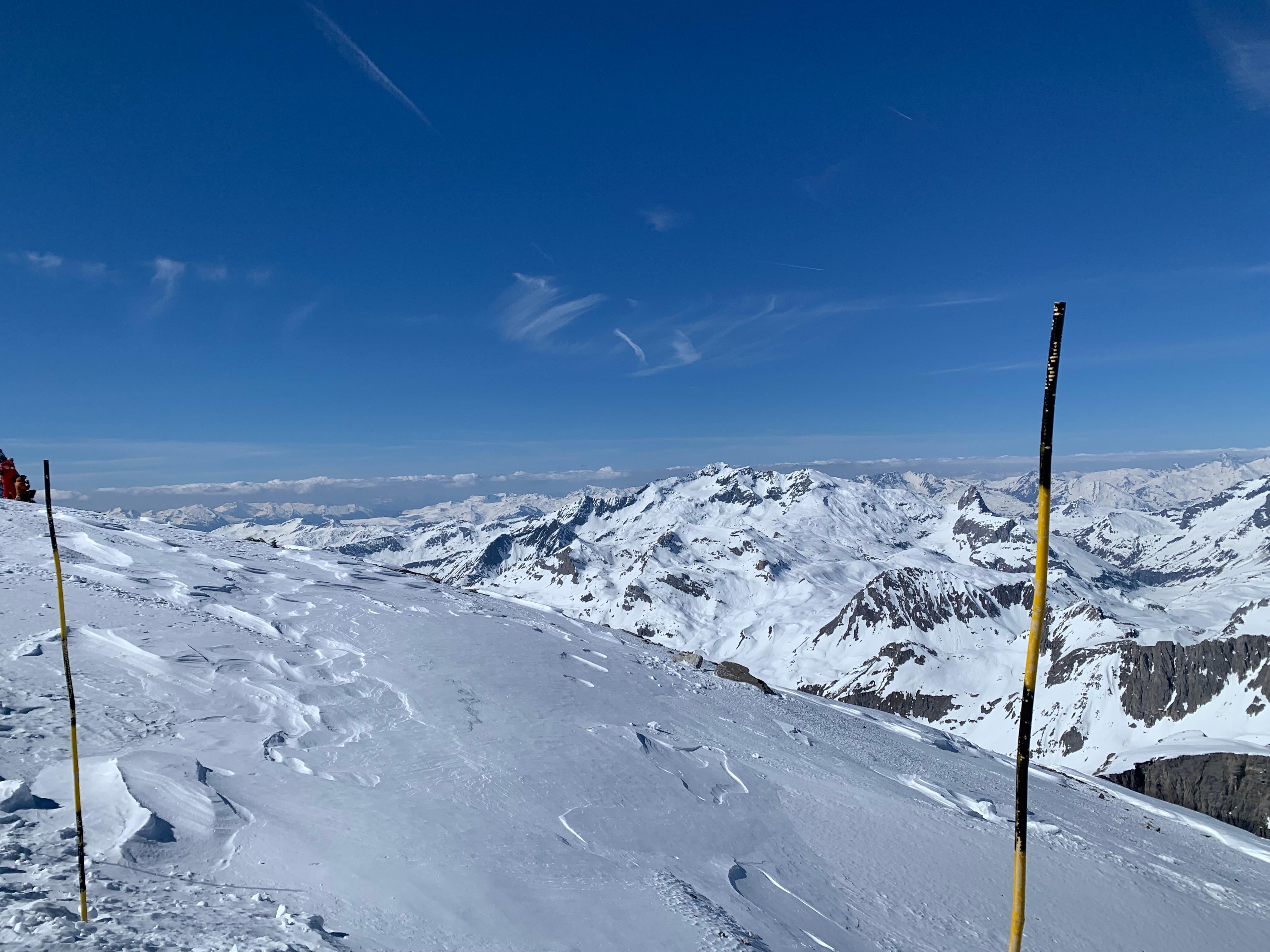 Marvelous views at Top of grande Motte 3450m - reach by funicular and cablecar wide red run ski run down