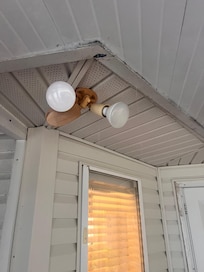 Leaking patio ceiling. Don’t know how it doesn’t catch on fire!