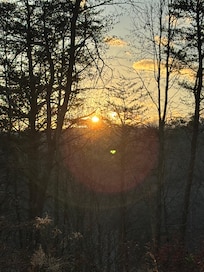 Sunset from the back porch rocking chairs