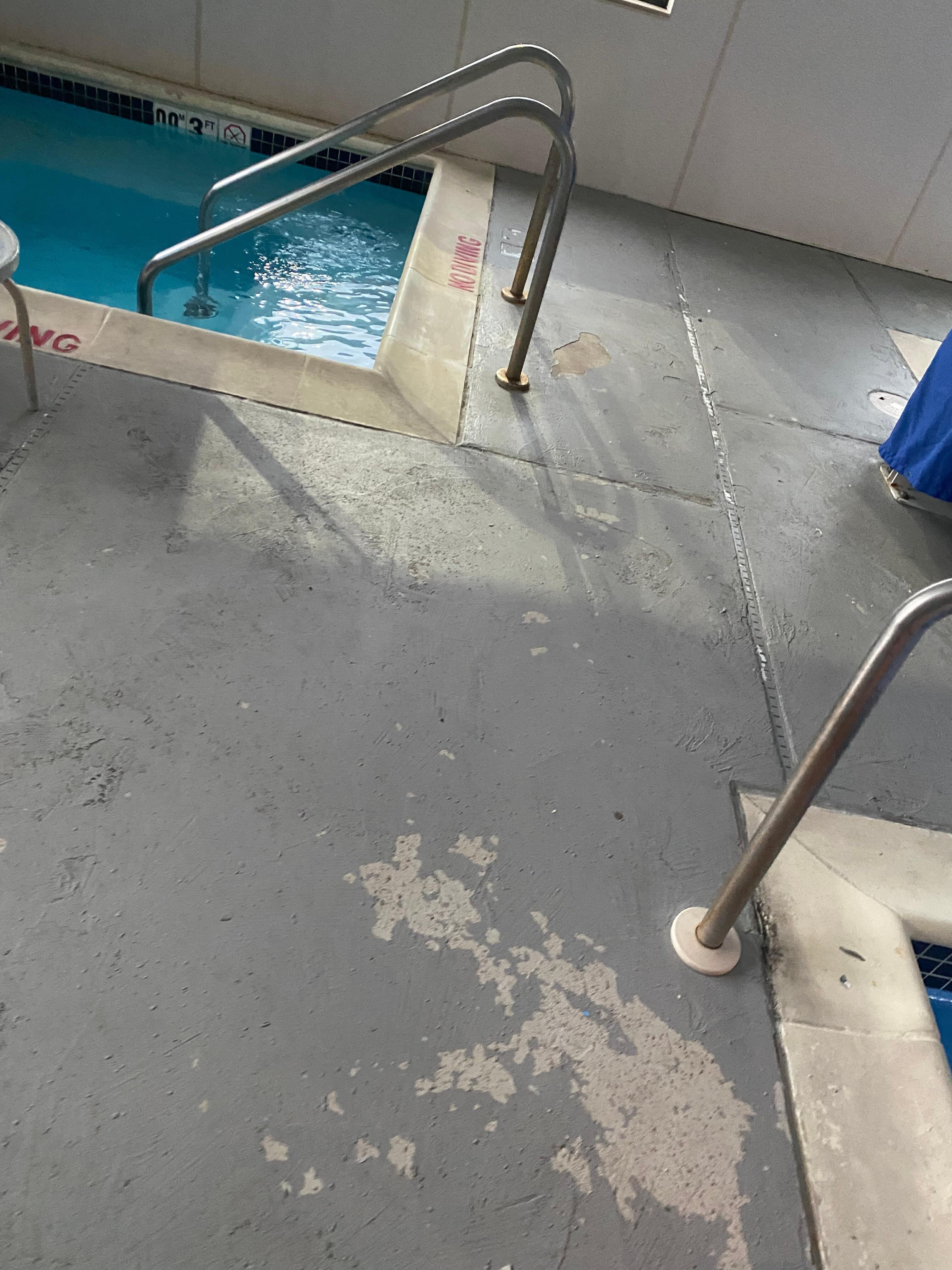 Concrete chips and hazards kids and or people can cut or trip on 