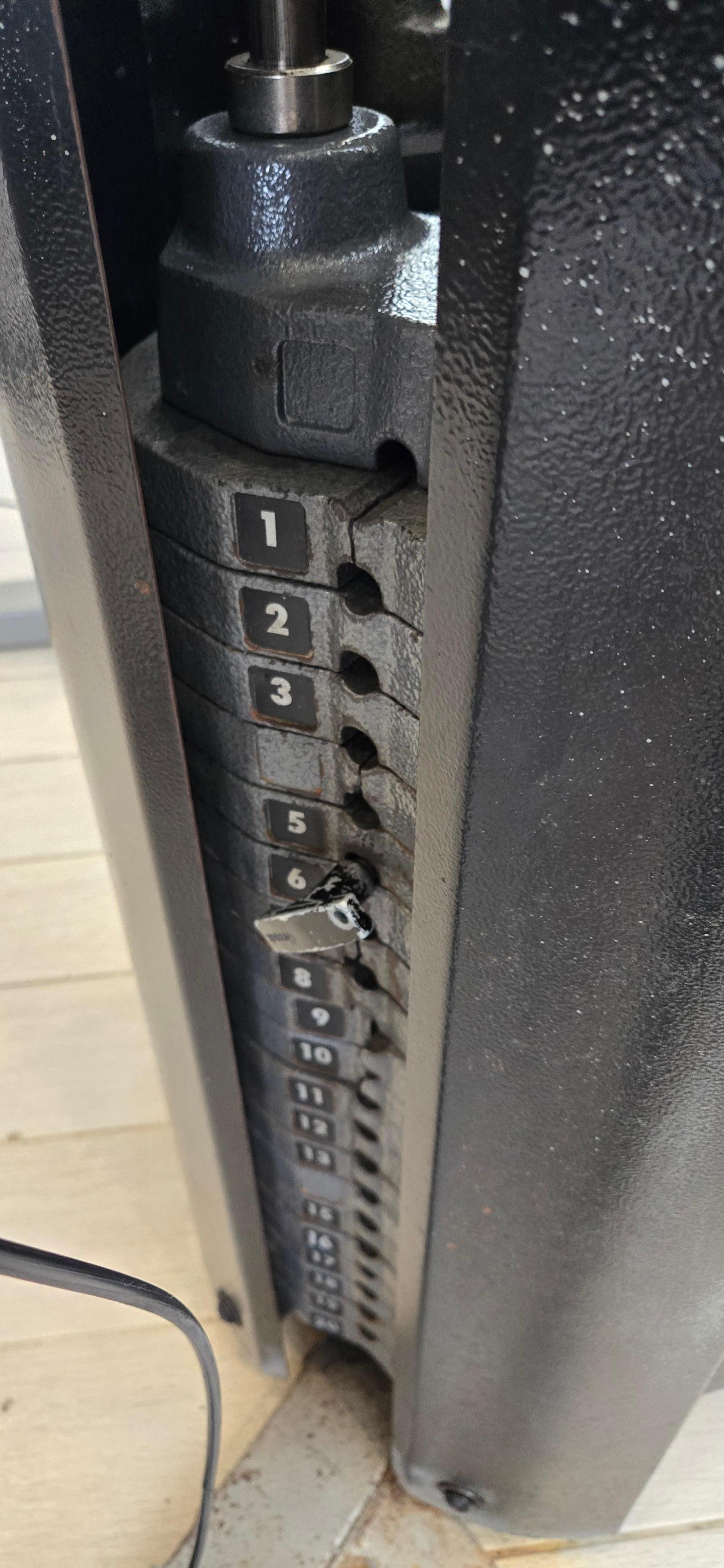 Broken weights.  One pin to share for all the weight machines 