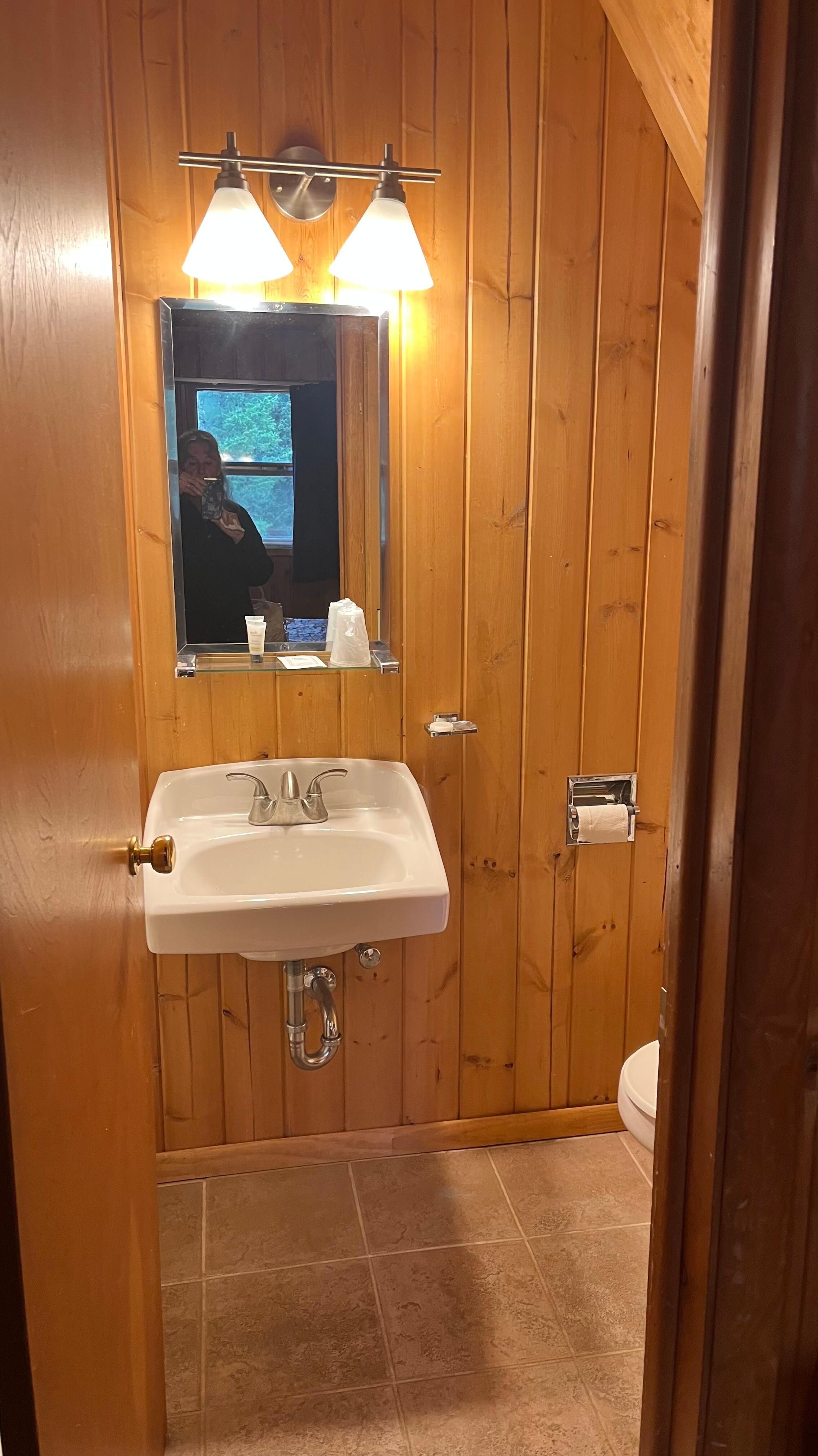 Bathroom, toilet & shower stall.