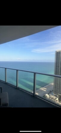 View from balcony from inside of room.