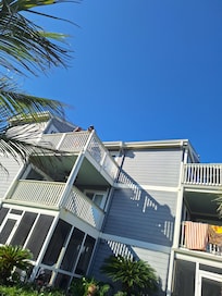 View of the deck from the pool.. top one.