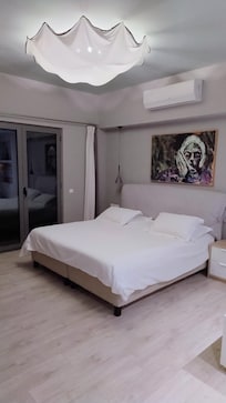 Huge bed in large apartment.