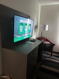 Tv in partitioned bedroom