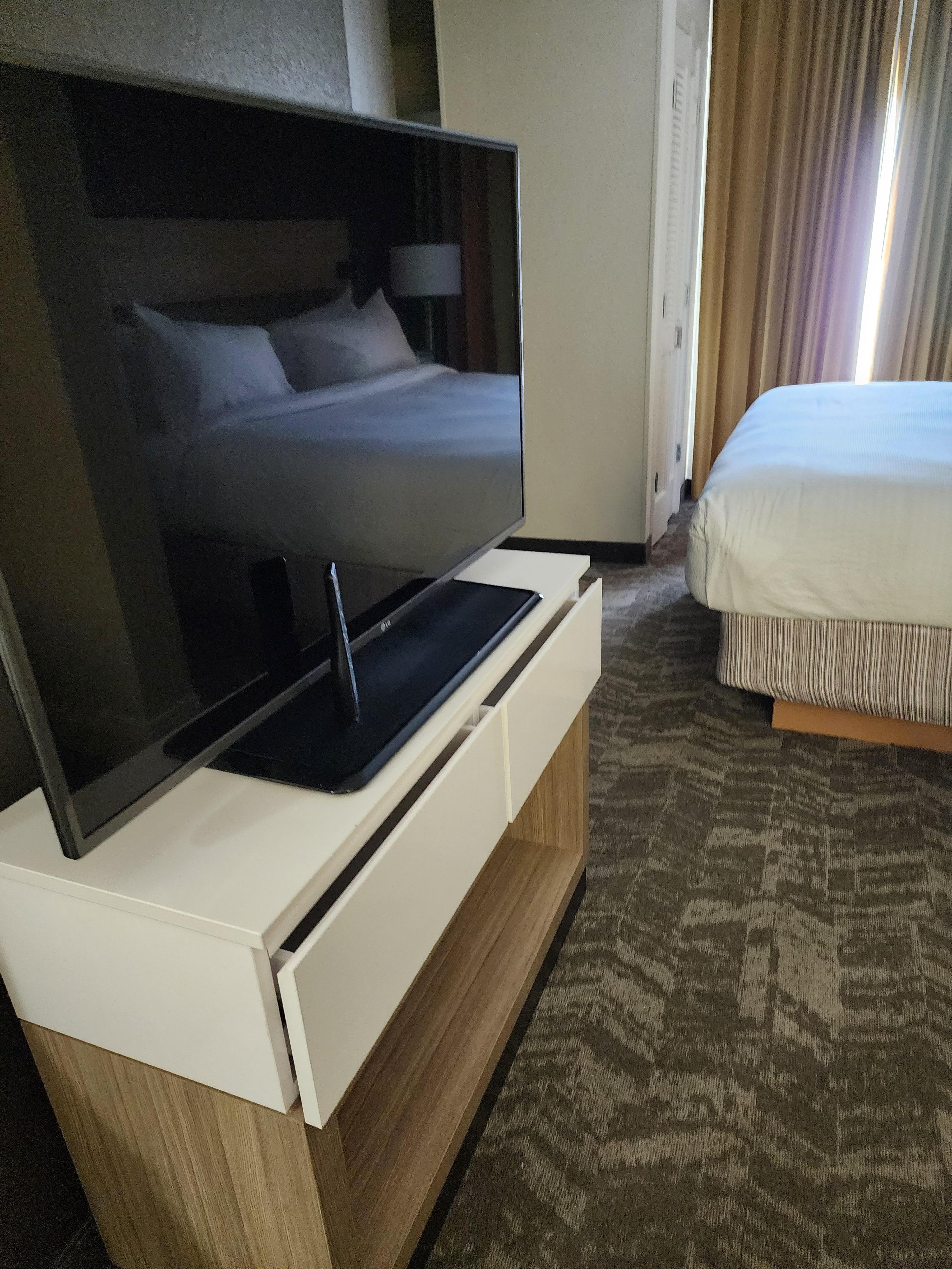 Large TV that can rotate if you want to watch it from your bed