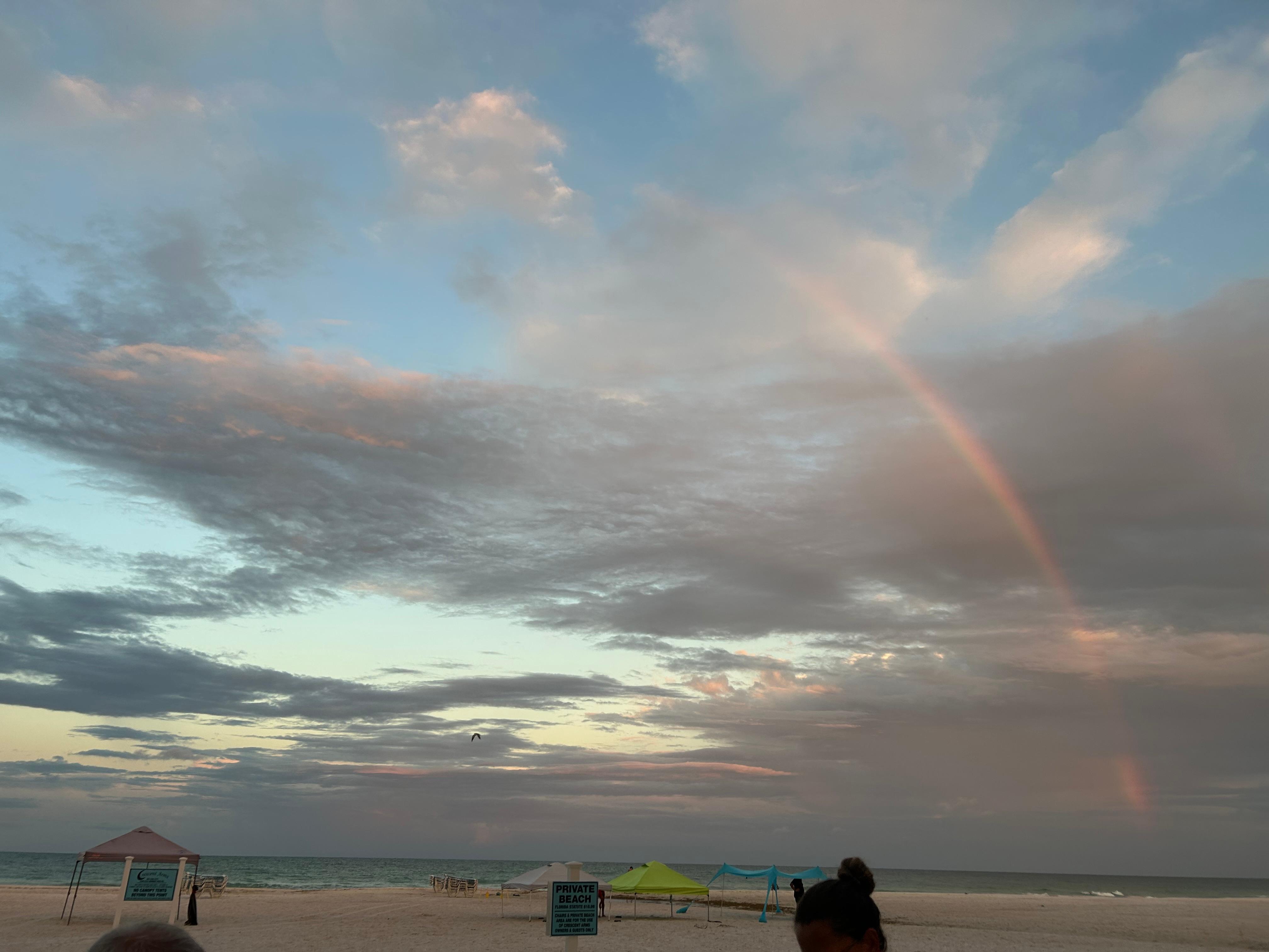 Morning rainbow on the beach