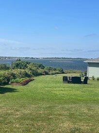 View of mussel beds from cottage side porch.