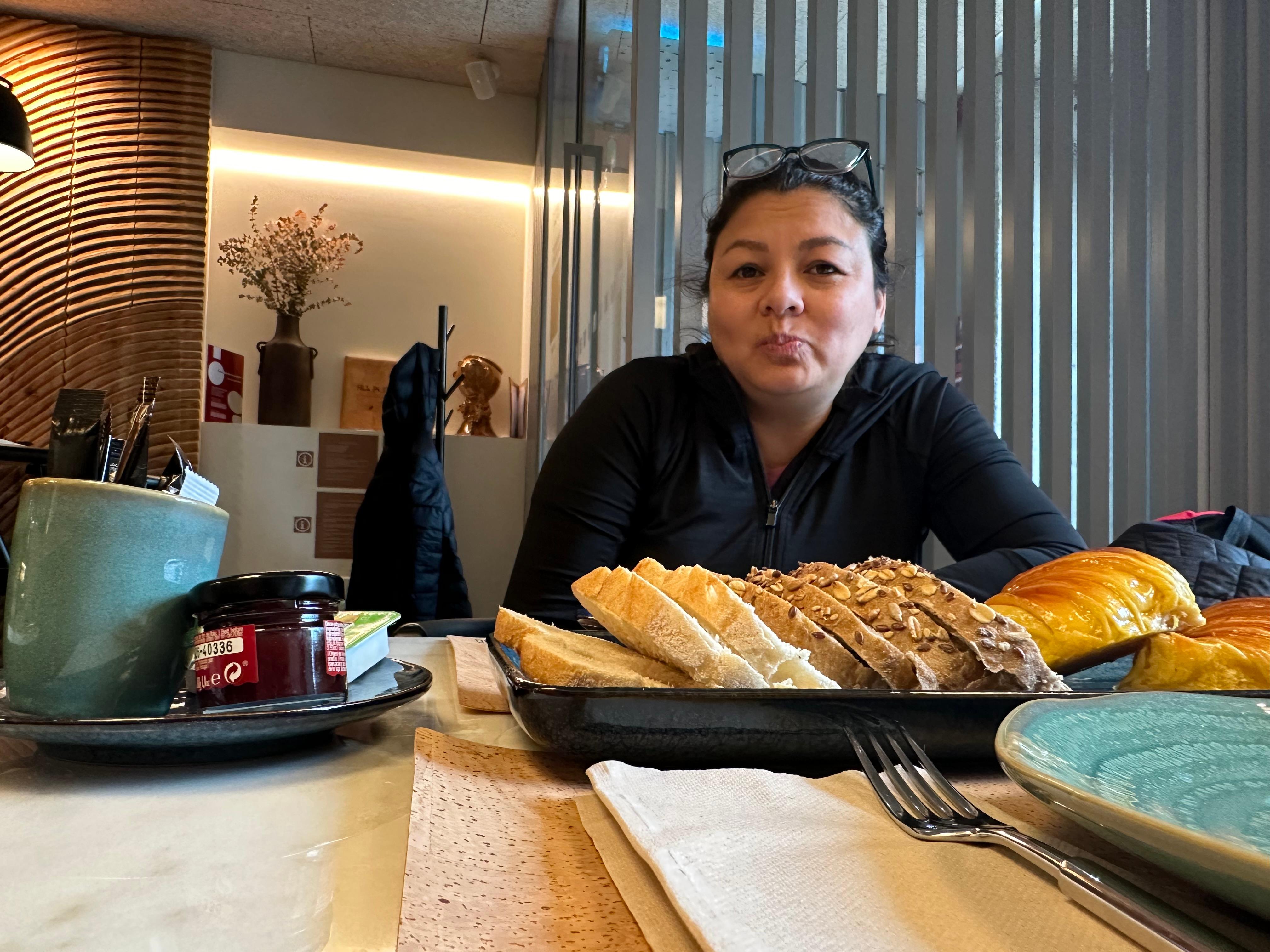 My wife at breakfast.