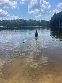 In the water with a remote control boat.