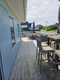 Deck upstairs heaps of outdoor seating to look out at the sea.