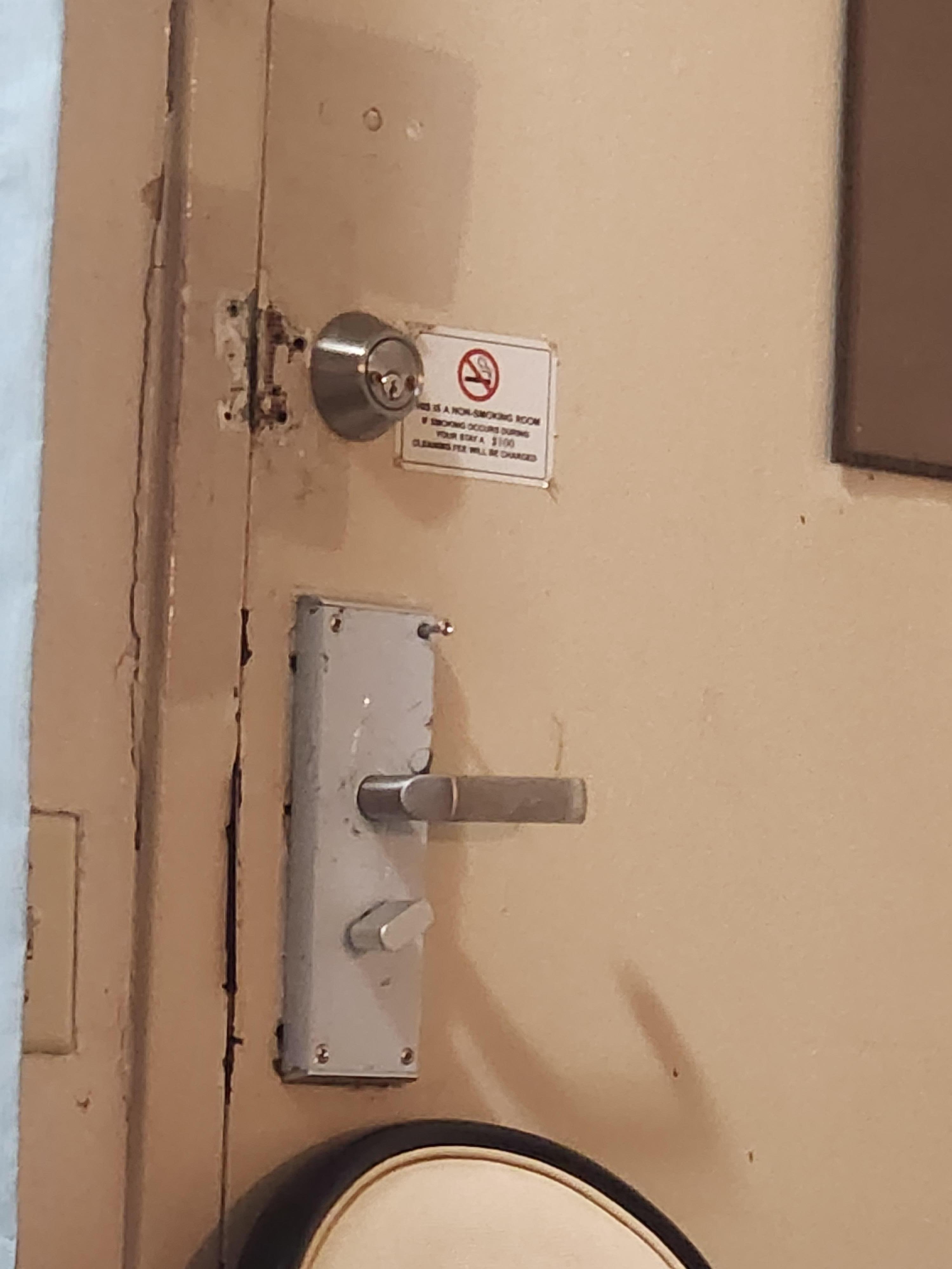 2nd room, Door did not lock and knob was loose.