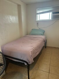 There is a tiny side room that looks like a jail cell. Bed was not comfortable at all.