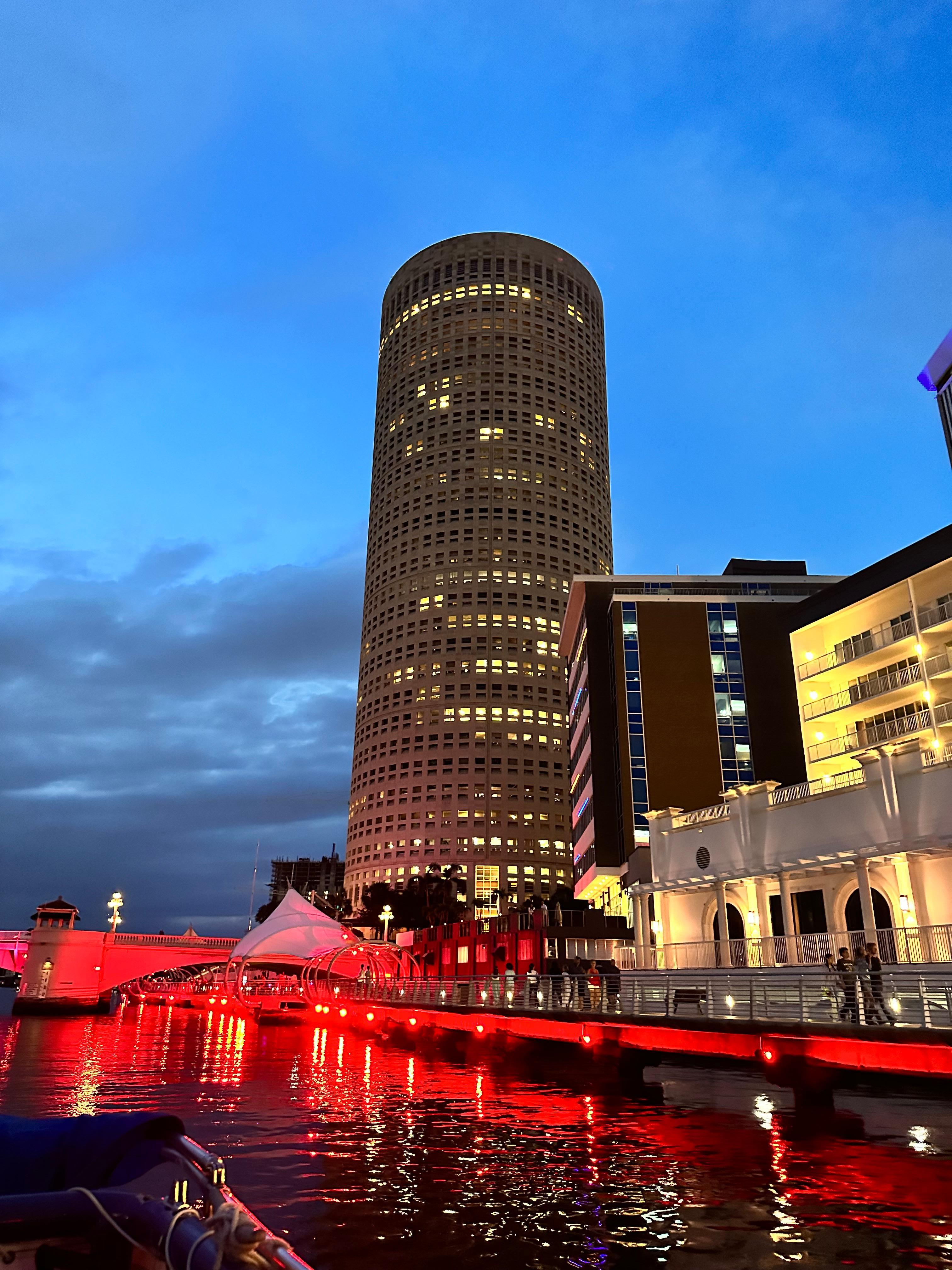 "The Beer Can" building seen from the river at night