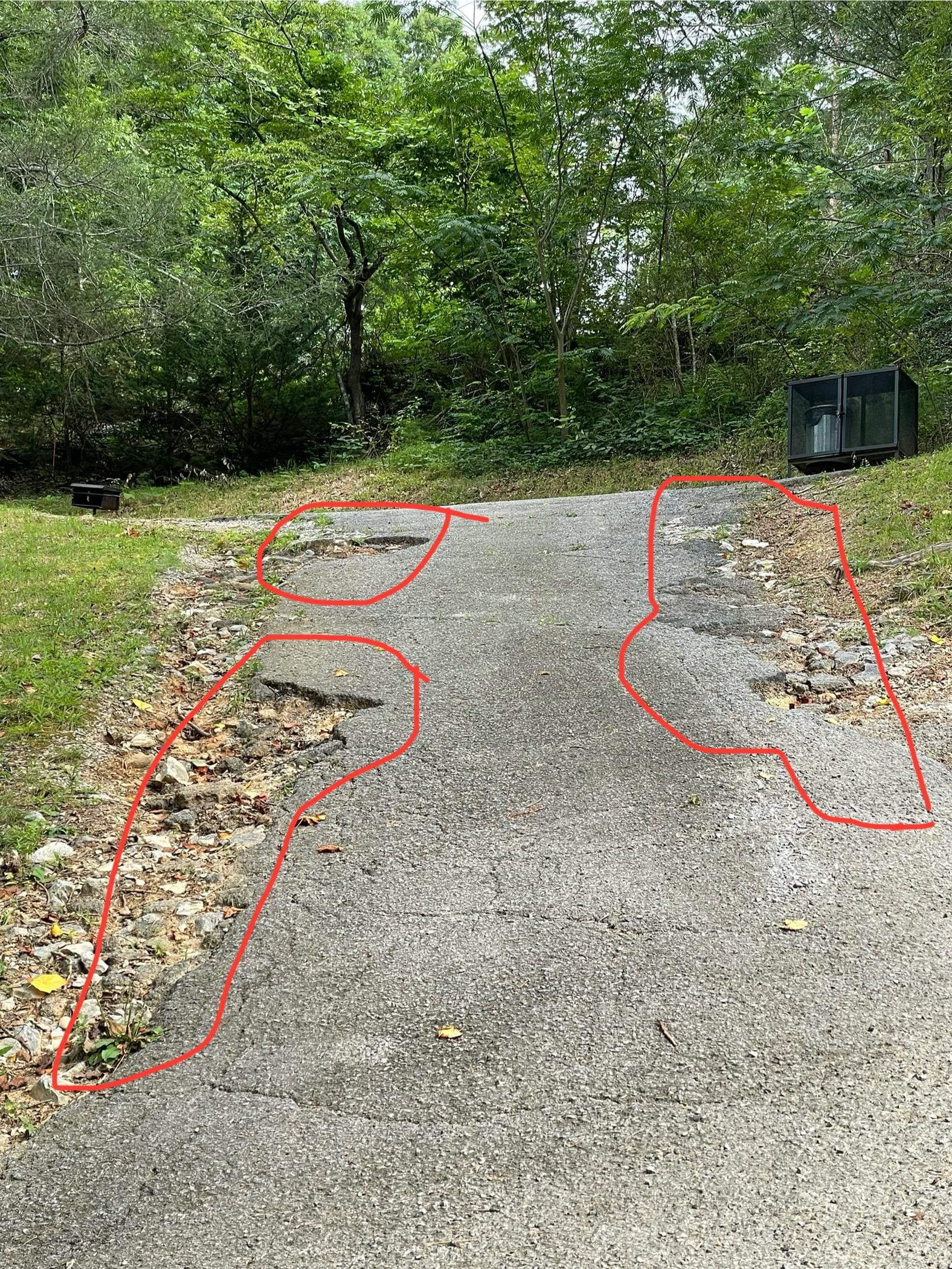potholed steep driveway