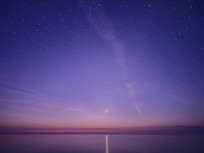 View of The night sky just before the sunrise on the back deck