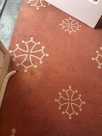Stains on carpet (there were stains all over the room & all over the hotel)