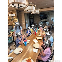 Dining tables fit 14 each.