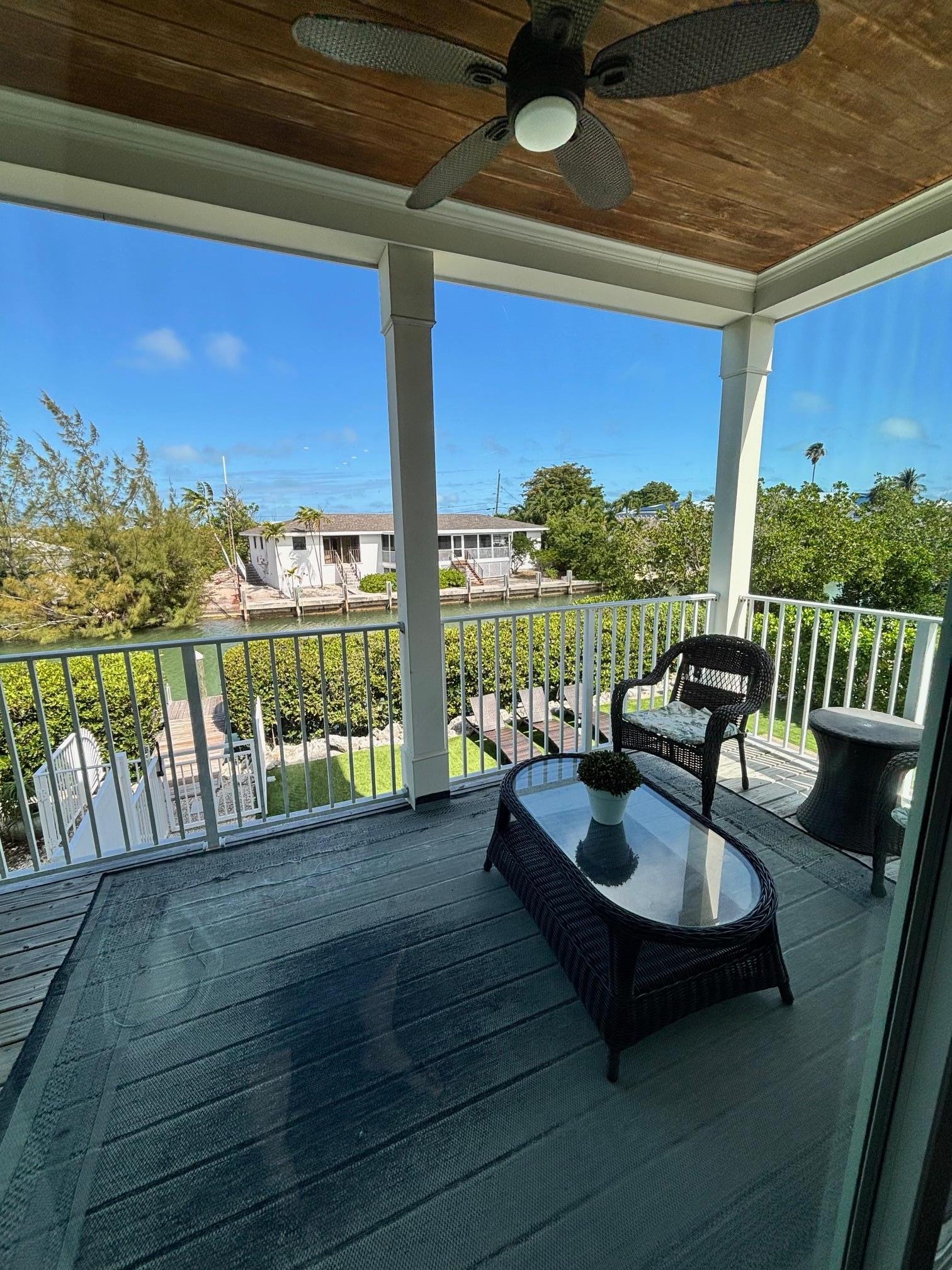 Lovely screened in porch, just needs a few more chairs.